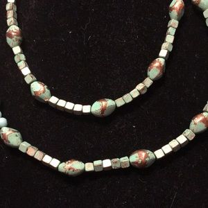 42” approximately faux turquoise w/ copper accents